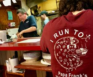 waiter with a Papa Frank's t-shirt